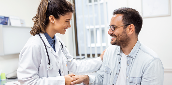 Doctor shaking hands with patient