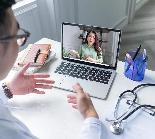 Doctor using phone